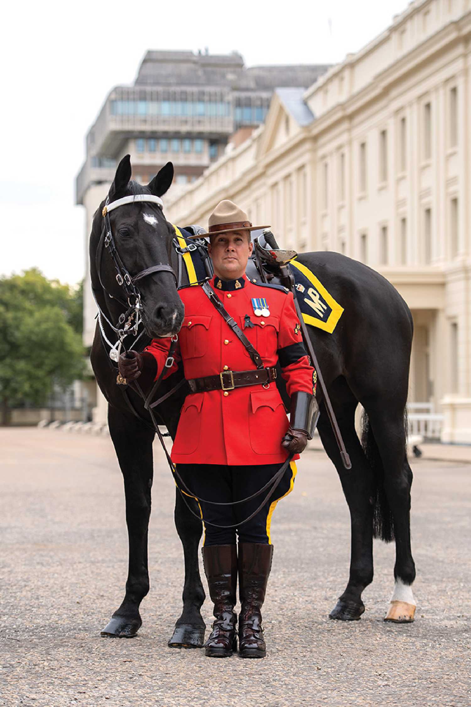 Honoring the Queen: On Monday, when the late Queen Elizabeth was laid to rest, four RCMP officers on horseback led the Queens funeral procession. One of the four is Scott Williamson from Rocanville. 